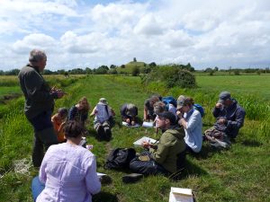 Helena_2-Nick-Stewart-explaining-Charophytes-to-SRPG-members-at-Southlake-Moor